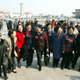 Women delegates to the Chinese People’s Political Consultative Conference walk from Tiananmen Square to a plenary meeting.